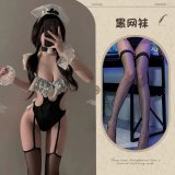 Black suit + black fishnet stockings
