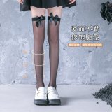A pair of black bow-tie stockings