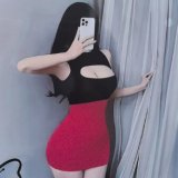 Black top + red skirt + black open-crotch socks