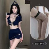 Female police officer + black fishnet stockings