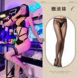 Leather suit + chain + fishnet stockings