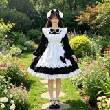 Black long-sleeved Lolita dress with bow + apron + headband included