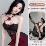 Dark floral pattern + lace-trimmed black stockings