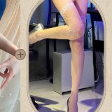 Pink suit + white fishnet stockings
