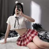 Top + red plaid skirt + ribbon
