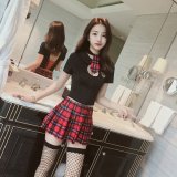 Tie + shirt + skirt + fishnet stockings