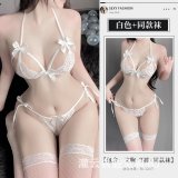White + model's white fishnet stockings