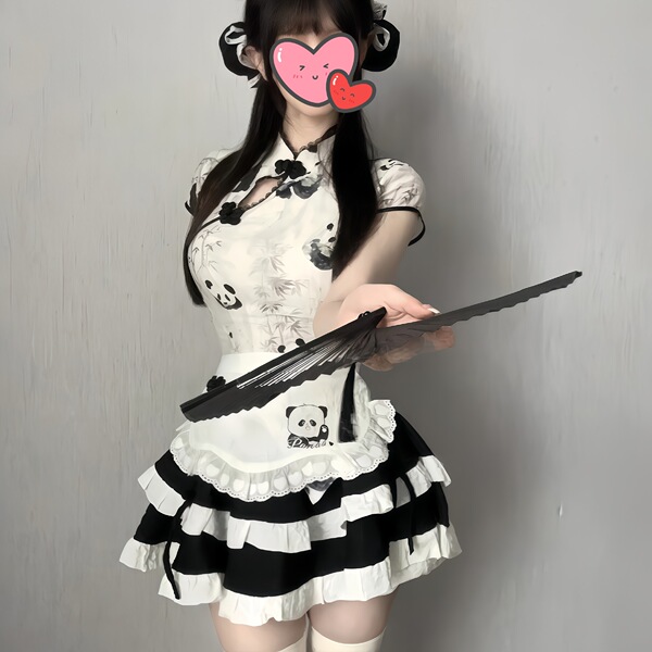 A woman wears a cute panda-themed domoira chinese-style maid outfit, featuring a black and white dress with ruffles and a fan...