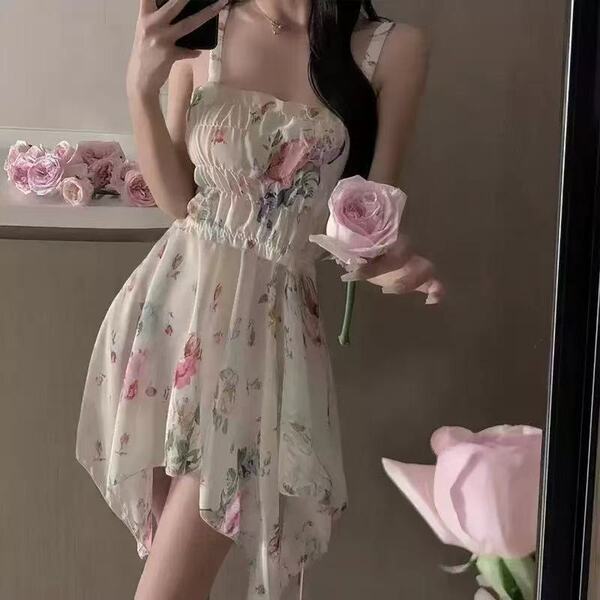 A woman wears a french-inspired lace sleep dress featuring vintage floral patterns, perfect for a sexy and flirty look.