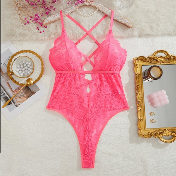 Pink lace bodysuit with crisscross straps, elegant design, perfect for women seeking sexy european-style erotic lingerie.