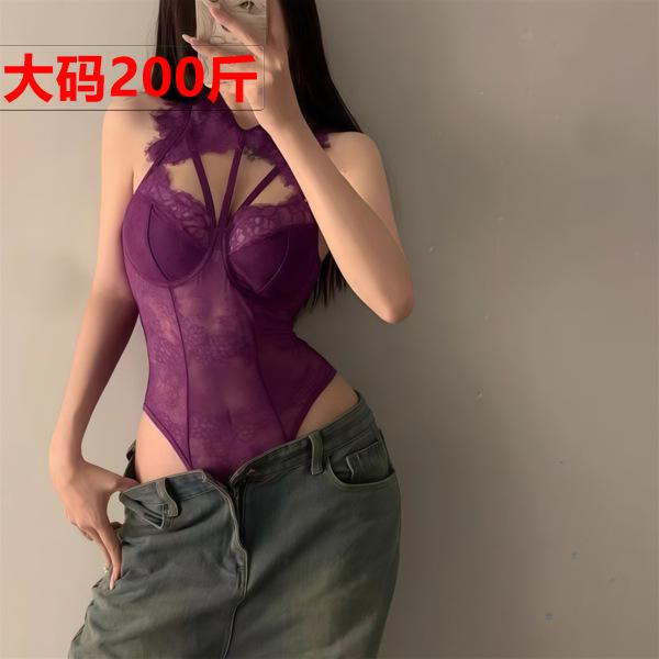Woman modeling purple lace lingerie set with sheer bodysuit and jeans, plus size seductive sleepwear costume.