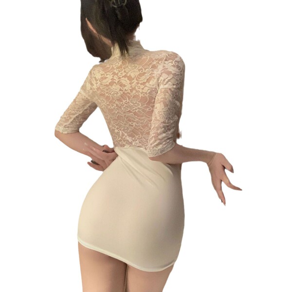 Back view of plus size sexy secretary outfit featuring lace top and bodycon skirt for women up to 200 lbs.