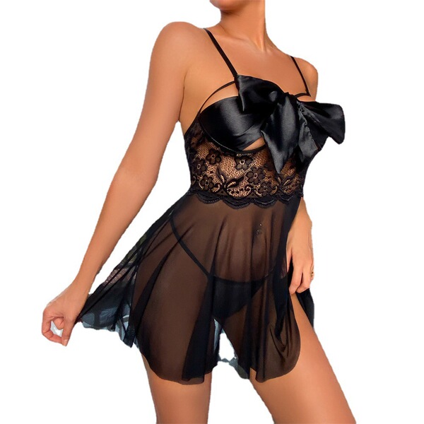 Woman wearing black sheer lace bodysuit with large bow, backless design, luxury lingerie sleepwear.