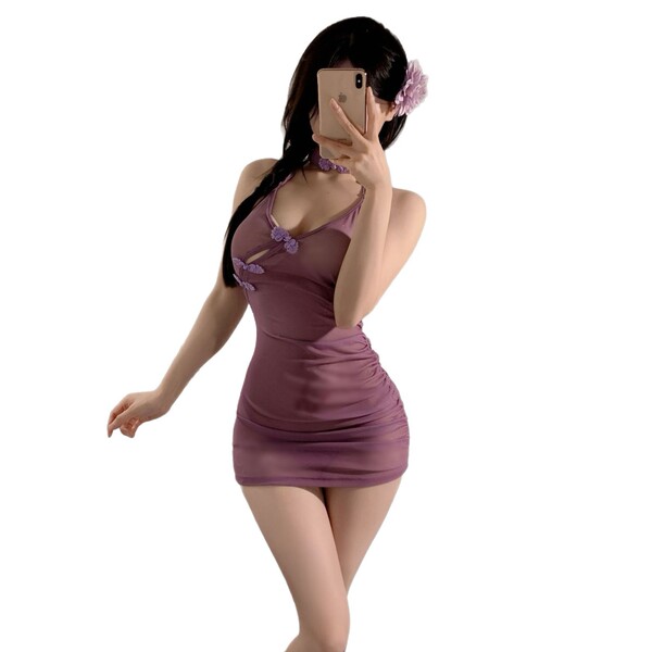 A woman poses in a 2025 sexy chinese-inspired lingerie set, featuring a sheer mesh qipao sleep dress with tied waist and body...