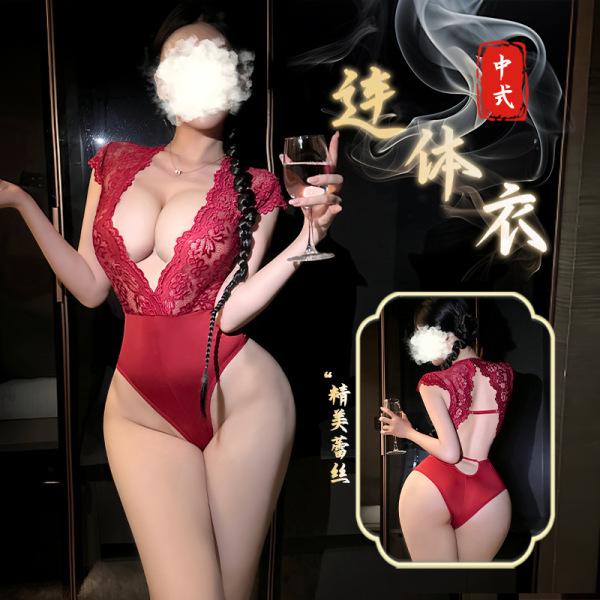 Woman in red lace bodysuit holding wine glass, showcasing sensual open-crotch mesh sleepwear with intricate detailing.