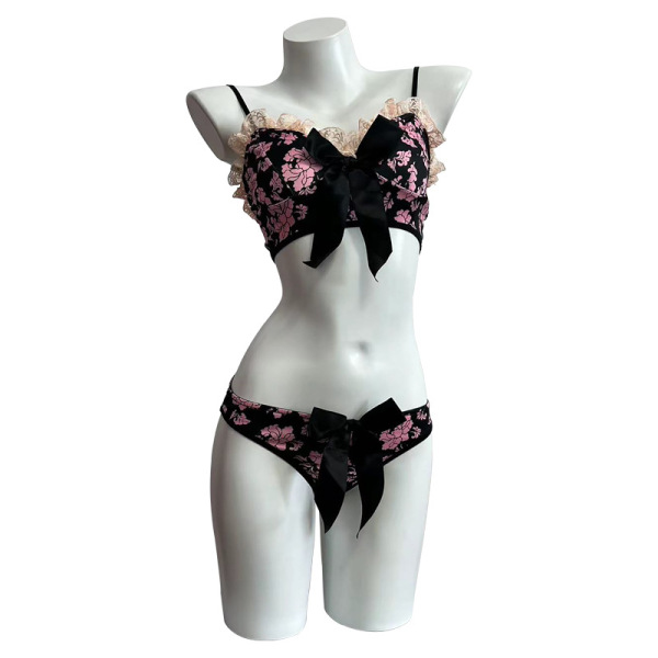 Adorable floral lingerie set with black bows, featuring a bare-chest bra and matching bare-butt panties for pure seduction.