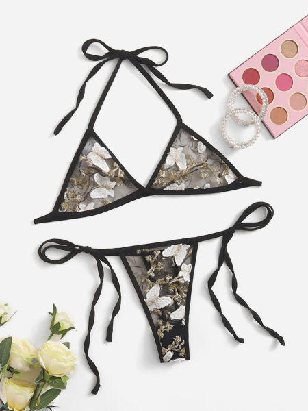 Black lace bra and thong set with floral embroidery, elegant bridal lingerie for women.