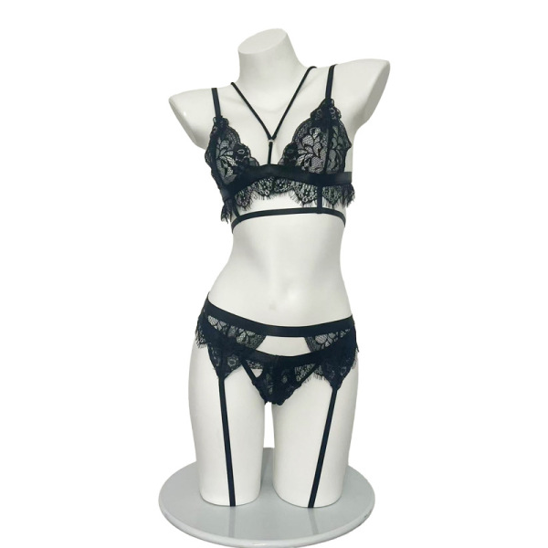 Black lace lingerie set with bra, thong, and garters on mannequin – qingruohan bondage temptation 3-piece adult outfit.