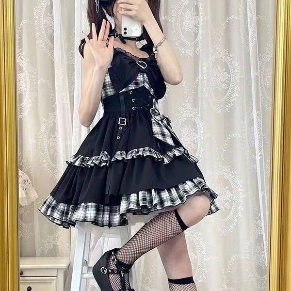 Gothic rock lolita strap dress featuring dark twin black and red plaid design with lace trimmings, perfect for edgy fashion e...