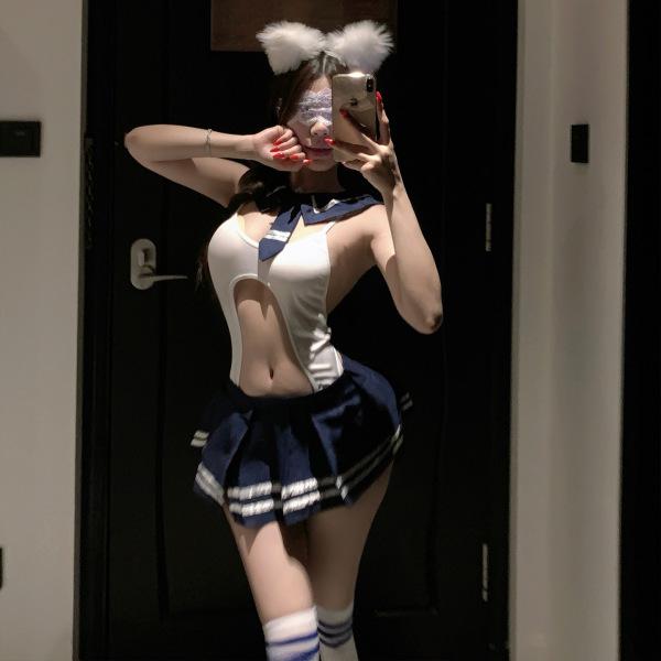 Woman in mirror selfie wearing pure & playful lingerie set — cute student-style jk erotic underwear with sailor collar, fluff...