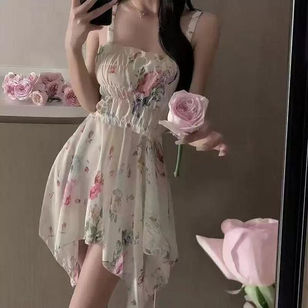 A woman wears a french-inspired lace sleep dress featuring vintage floral patterns, perfect for a sexy and flirty look.