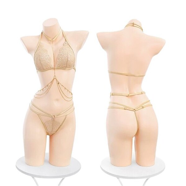 Sexy sheer lace bra and panty set featuring delicate gold chains, perfect for an alluring look.