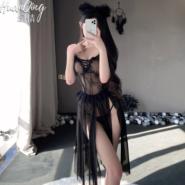 Woman taking selfie in sheer mesh lace tie-up sensual lingerie set featuring 8-petal skirt, breast-baring design, and adjusta...