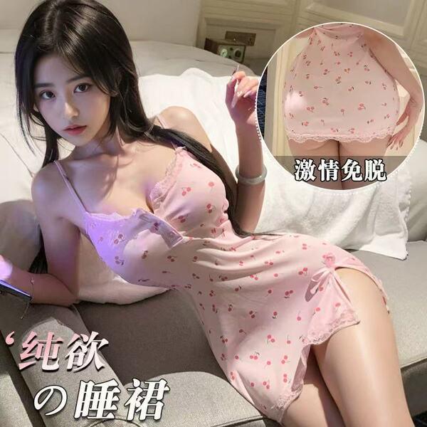 Woman modeling pink cherry blossom lace babydoll nightgown with thin straps and floral pattern.