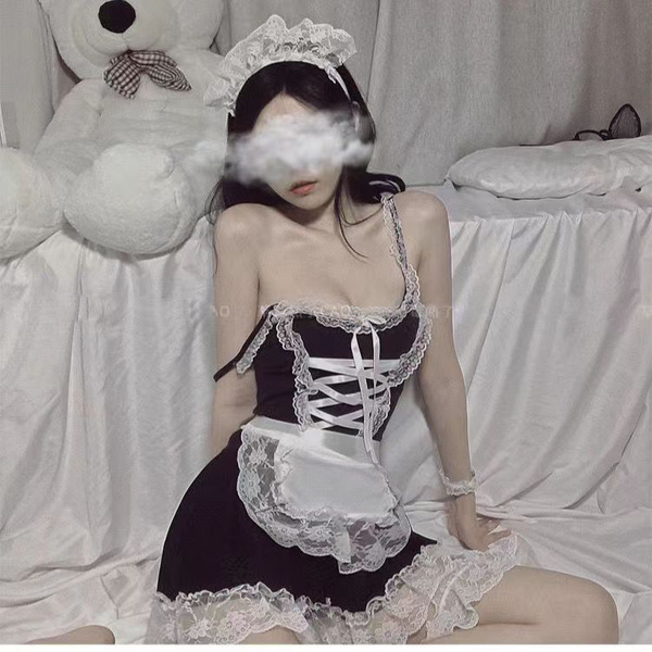 Sexy maid costume for women featuring a black lace dress with white accents, perfect for role play and at-home fun.