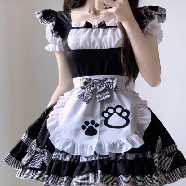 Adorable maid costume featuring a kawaii cat design, perfect for lolita fashion and anime cosplay with a charming pet paw mot...