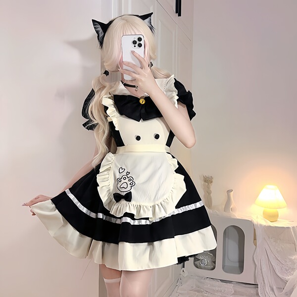 A woman models an adult womens cosplay maid dress, featuring black and white colors with cat ears, perfect for student partie...