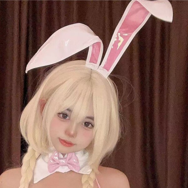 Blonde wig with bunny ears, pink bow tie, and eye mask accessory set for cosplay.