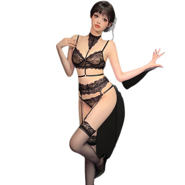 Woman modeling black lace ai ru ru lingerie set with garter belt and thigh-high stockings, elegant pose.
