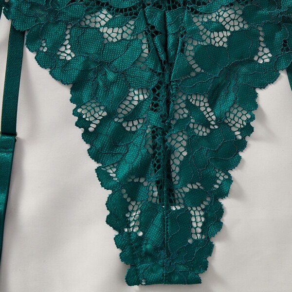 Teal lace bodysuit with floral pattern and open-crotch design, part of amazons new lace temptation lingerie set for women.