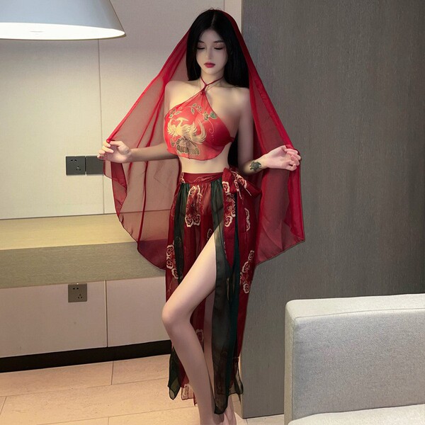 A woman models an ancient chinese court-style lingerie set featuring a sensual hanfu bodice with embroidery and a sheer flyin...
