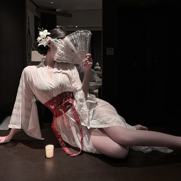 A woman elegantly poses in an ancient chinese hanfu robe set inspired by the qin-han dynasty, featuring intricate designs and...
