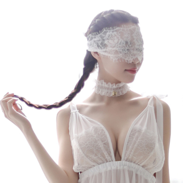 Elegant white lace eye mask paired with black lace details, perfect for sensual sleep or roleplay accessories.