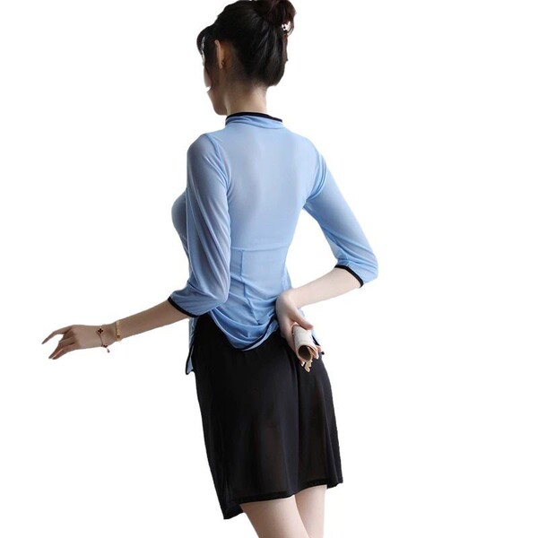 A woman models a blue lace cheongsam lingerie set, featuring sheer silk-blend fabric, perfect for vintage chinese-inspired se...