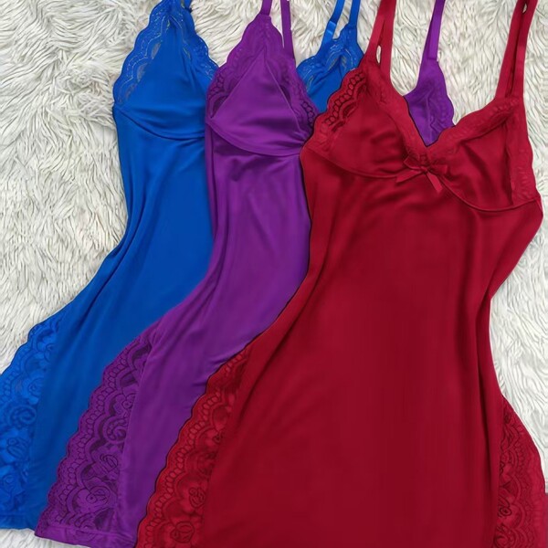 Three butterfly knot split slit cami sleep dresses in blue, purple, and red, displayed on a fluffy white background.