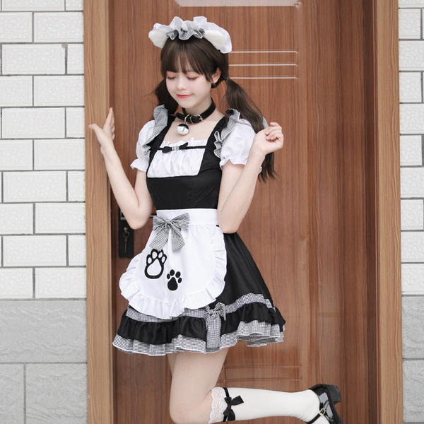 A stylish model poses wearing a black and white maid costume, complete with a cat paw design on the apron, perfect for cospla...