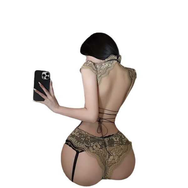 Woman in chao mu erotic lingerie set - thorny rose open-crotch bodysuit with adjustable ties, taking a selfie.