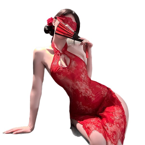 Woman in red lace cheongsam-style lingerie with fan and blindfold.