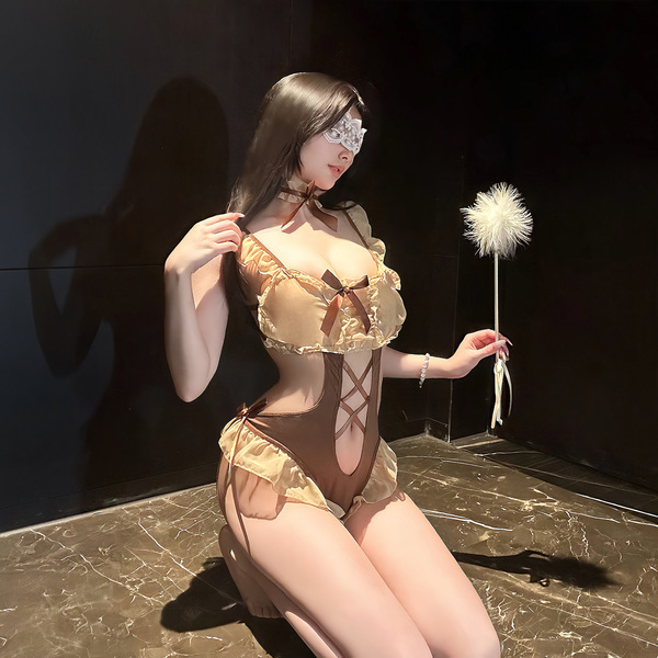 Woman wearing chao mu lingerie set, a sexy backless bodysuit with bow tie and ruffle trim, holding a dandelion.