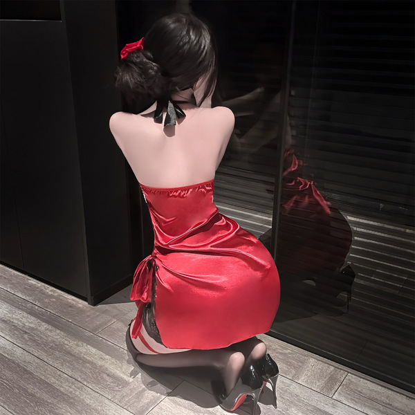 A woman kneels facing away from the camera, wearing a red satin chaomu rose lace tie-up lingerie set with black stockings and...
