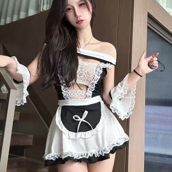 Woman wearing cherry love lingerie mini skirt set, a sweet and seductive maid costume with bow backless design for role play.