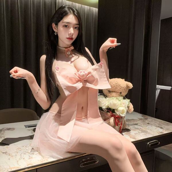 Woman modeling pink cherry romance lingerie set with bow details, sheer fabric, and no-remove design for small bust enhanceme...