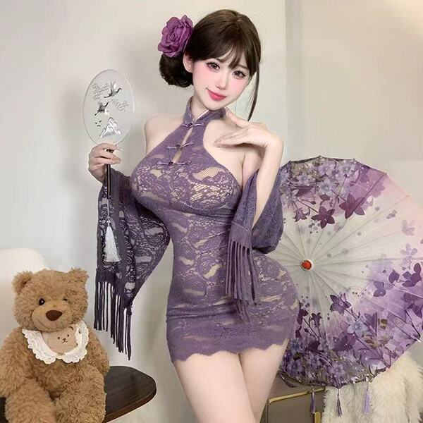 Woman in purple lace cherry romance lingerie set holding fan, with floral umbrella and teddy bear nearby.