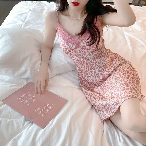 Woman in pink leopard print cherry romance lingerie set, sexy thin sleepwear with satin cami pajamas for spring fall.
