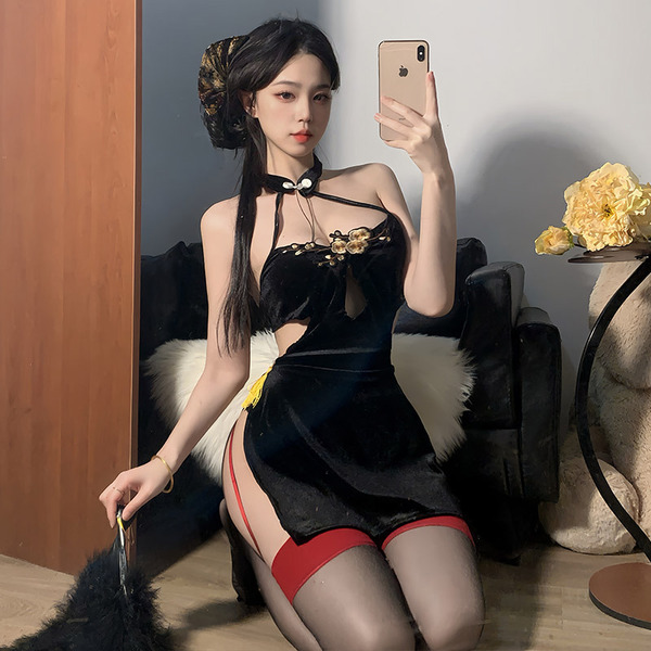Elegant modified cheongsam with high slit, backless design, and embroidered halter top, perfect for a chic and daring look.