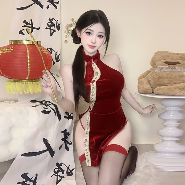Elegant red silk cheongsam dress featuring lace-up high-waist design, slit detail, and traditional knotted buttons, perfect f...